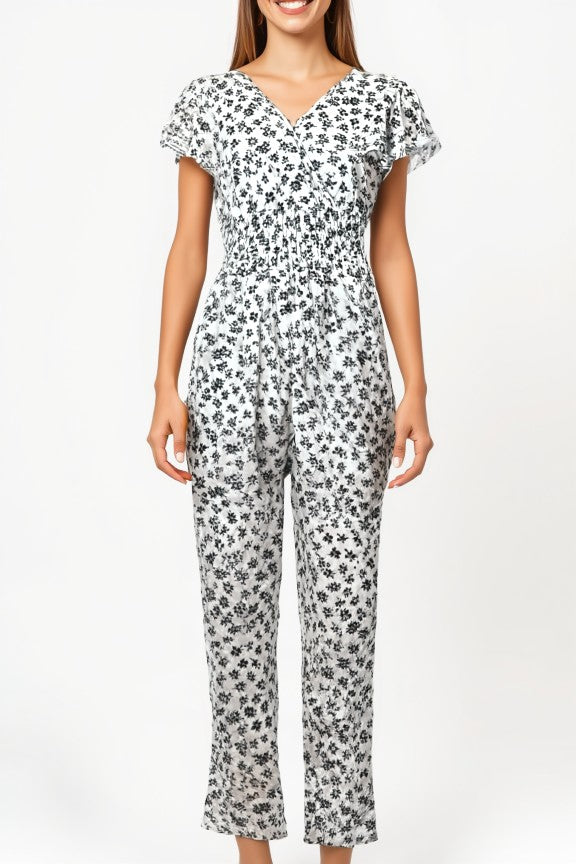 Women's floral print jumpsuit in white with short sleeves and shirred waist